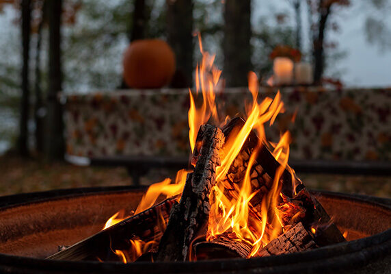 Image of a fire pit with active fire