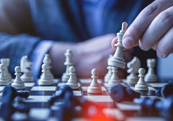 Man playing chess against opponent with no pieces