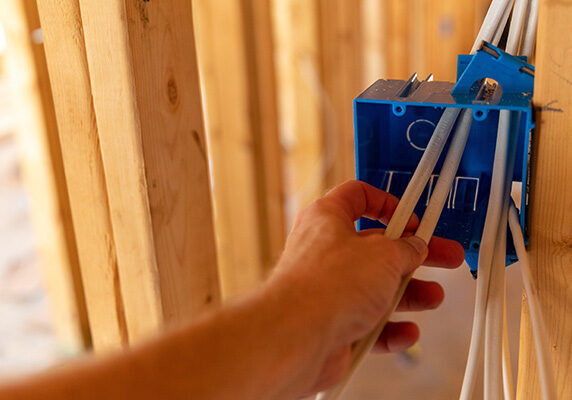penney-assoc-electrical-wiring-install Electrician installing electrical wiring