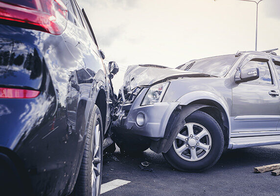 Two SUVs at a vehicular crash site